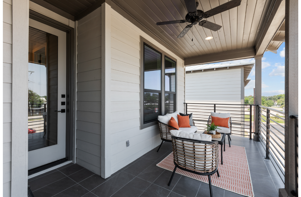 balcony on the 3rd floor with outdoor chairs