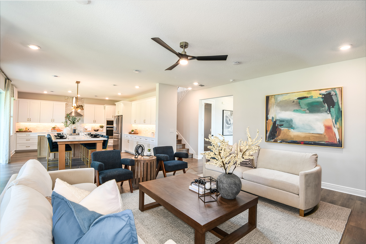 great room with two white sofas and two chairs