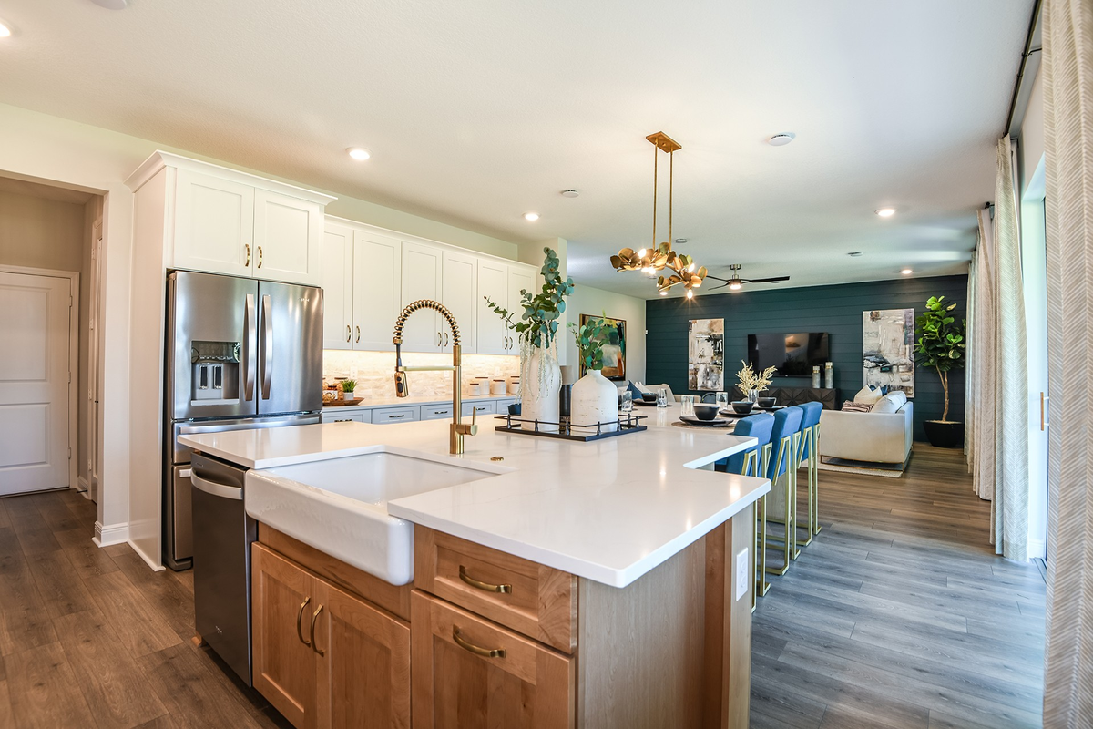 kitchen with gold hardware and light fixture