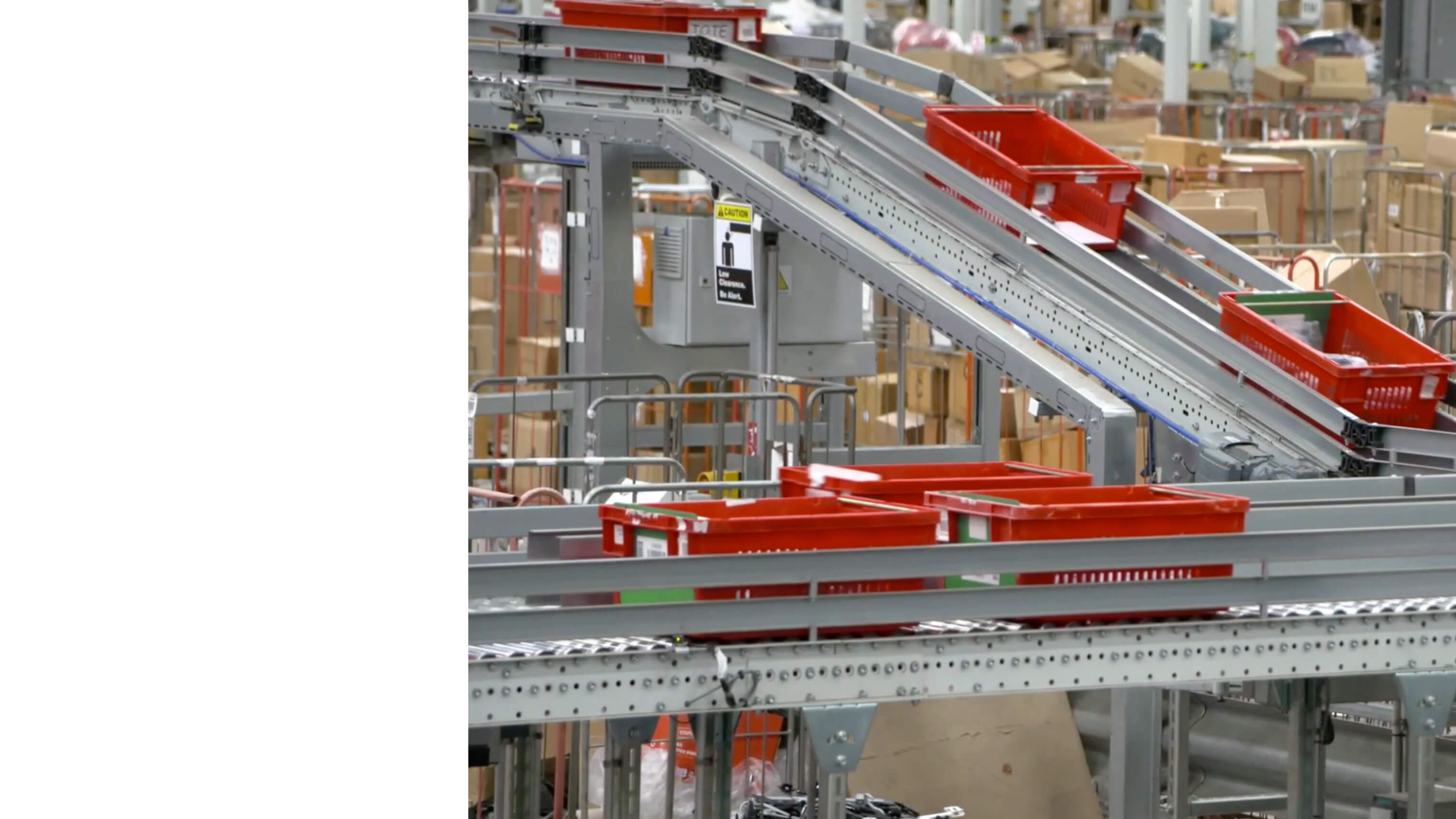 Image of containers moving on an assembly line.