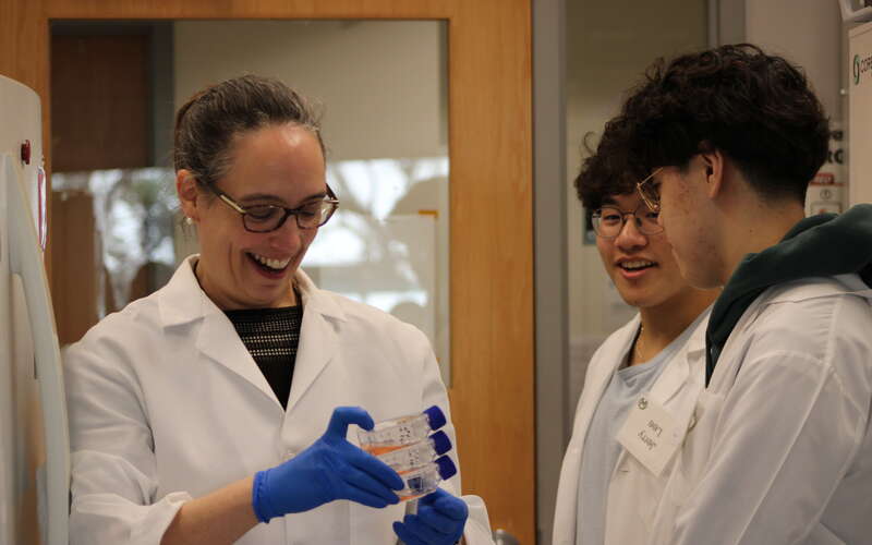 King High students interact with a researcher