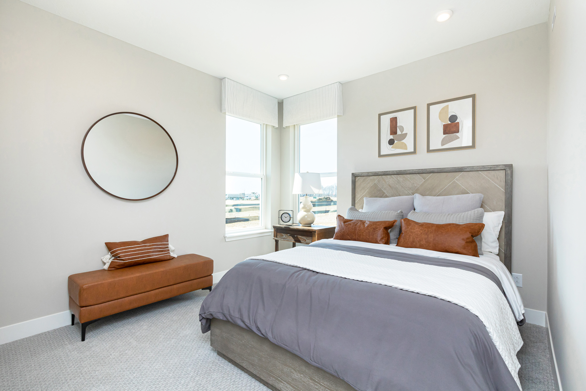 bedroom on the main floor with two windows 