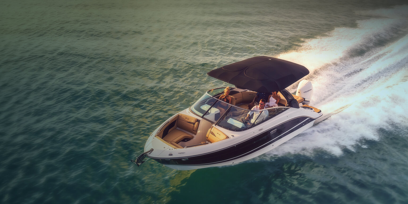 A speedboat sailing across the sea