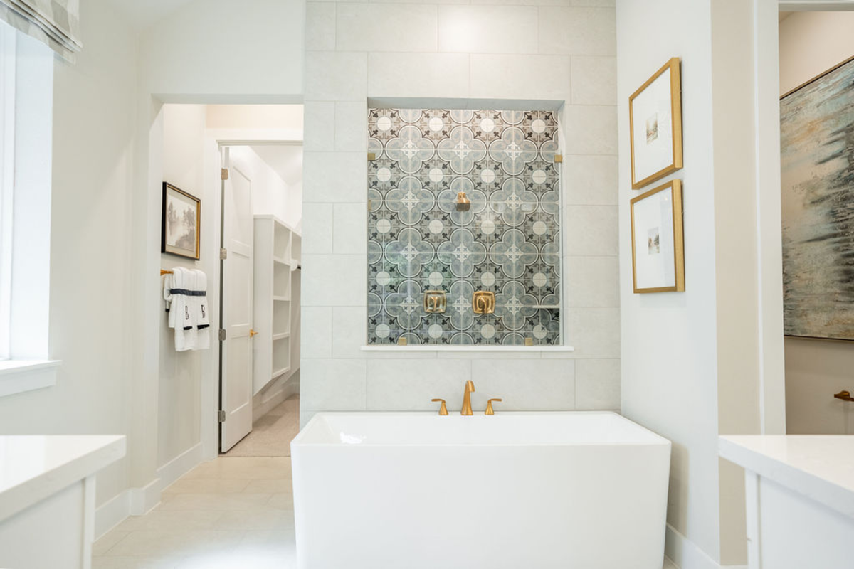 bathroom with freestanding tub and walk-in shower