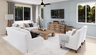 great room with large windows and neutral floors