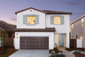 spanish colonial exterior featuring large driveway