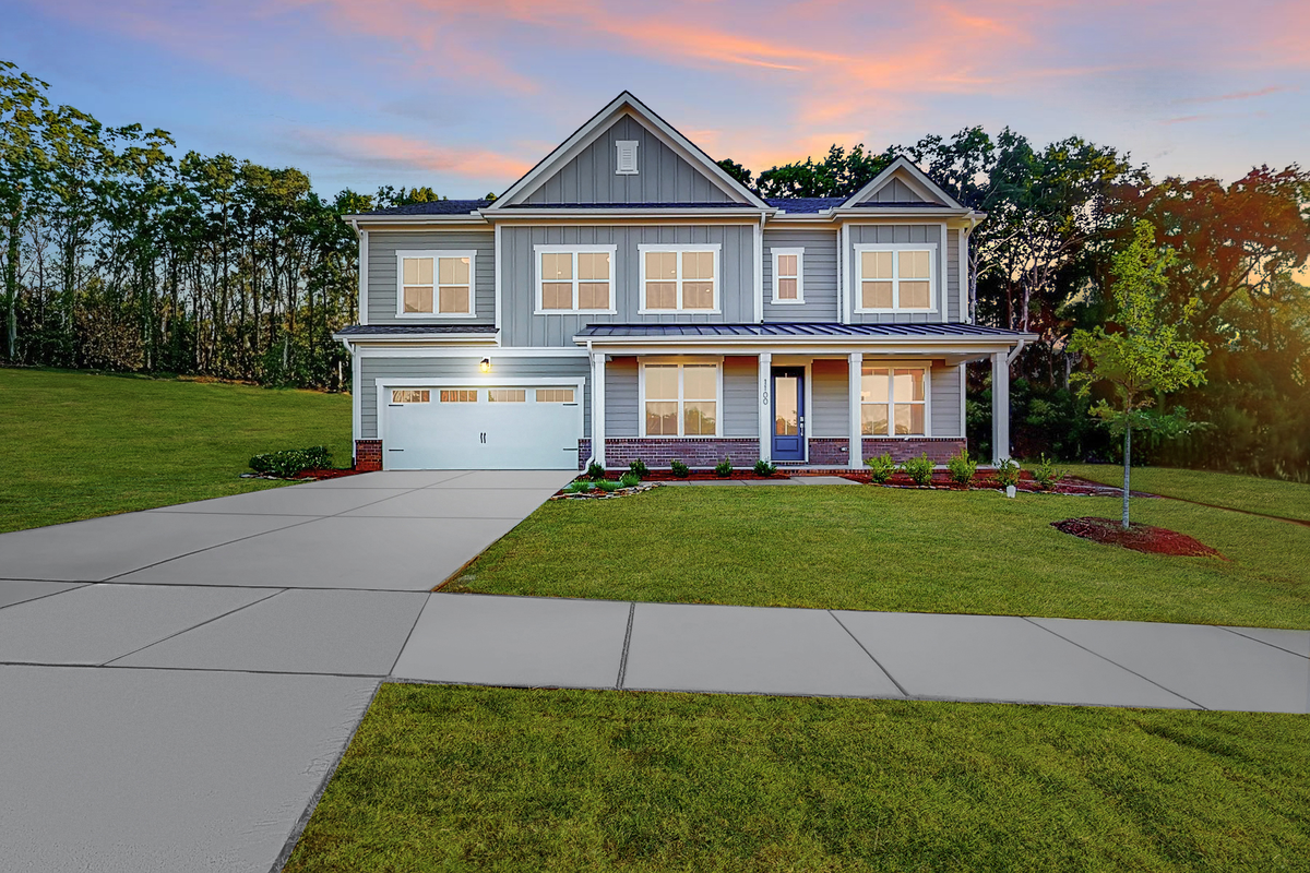 2-story exterior with garage & covered front door