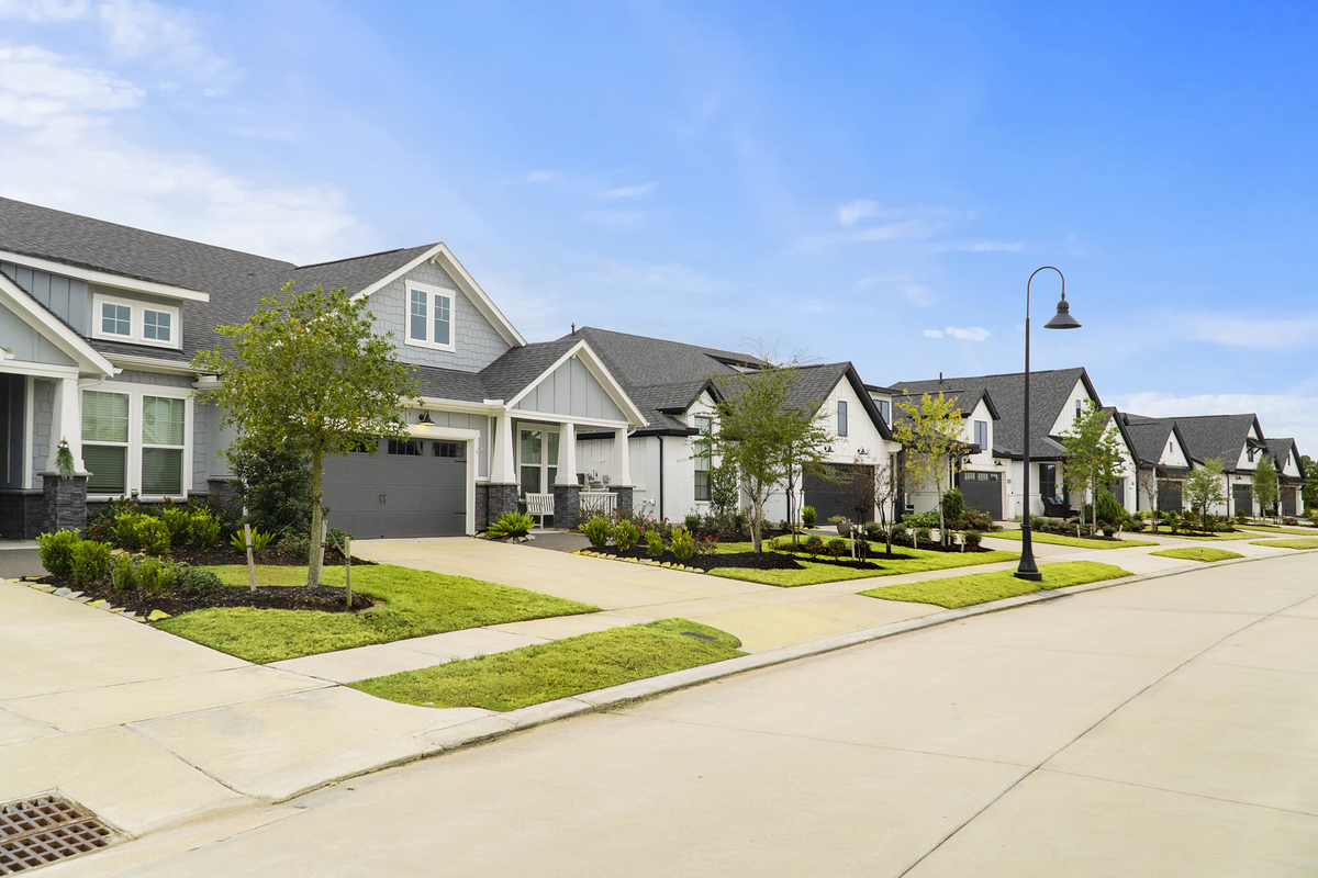 variety of exteriors with lush front yards