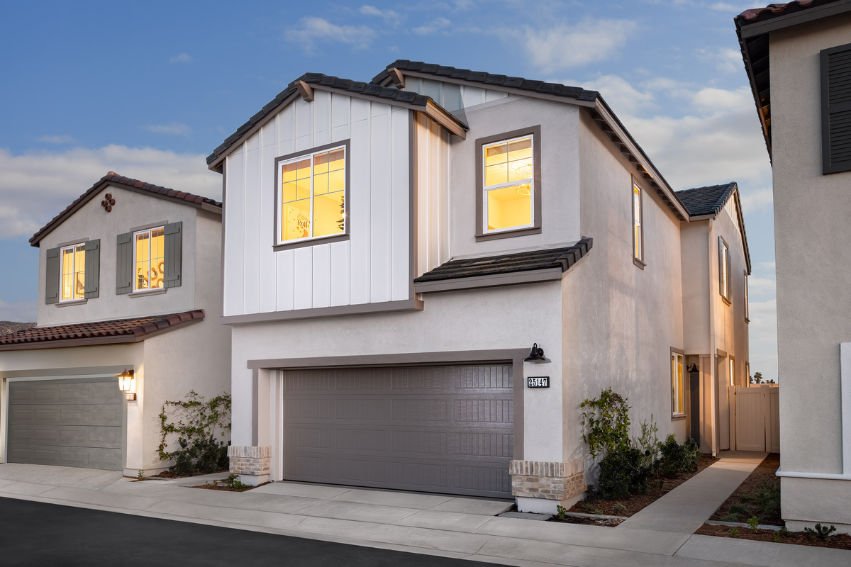 exterior of two-story home with two car garage