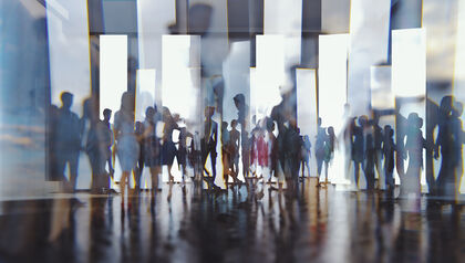 People in motion with reflective prism