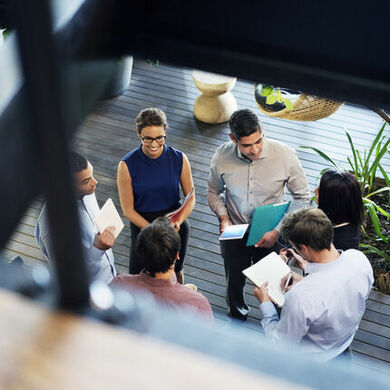 Birds eye view of business people meeting and talking
