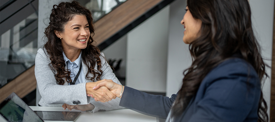 Someone meeting with a loan officer