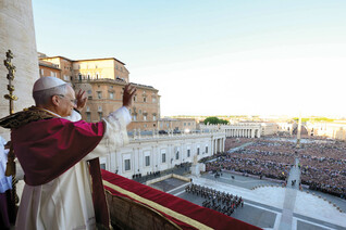 Pope Leo XIV waves to the crowd in St. Peter’s Square following his election as pope May 8.