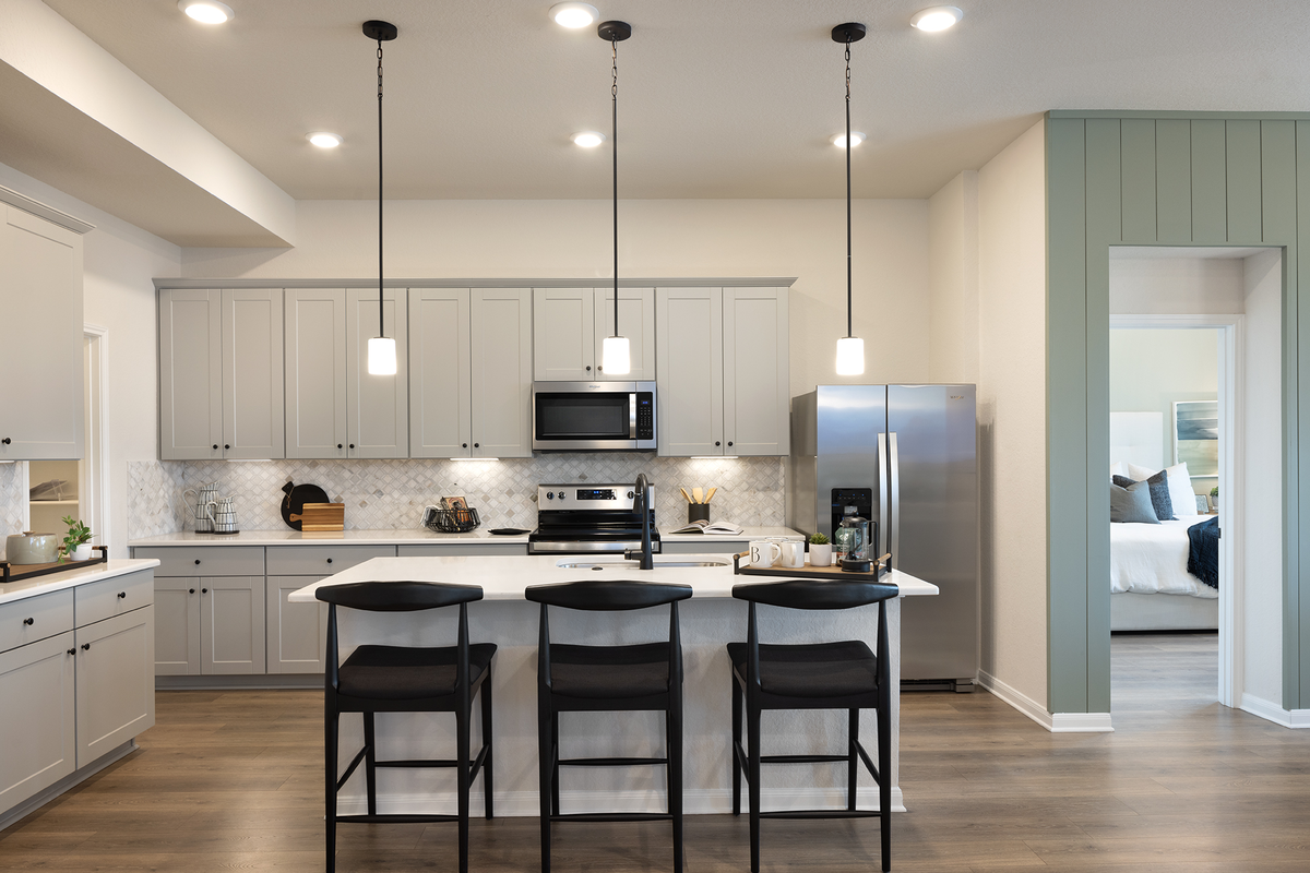 kitchen with white countertops & gray cabinets