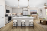 kitchen with neutral cabinets and large island