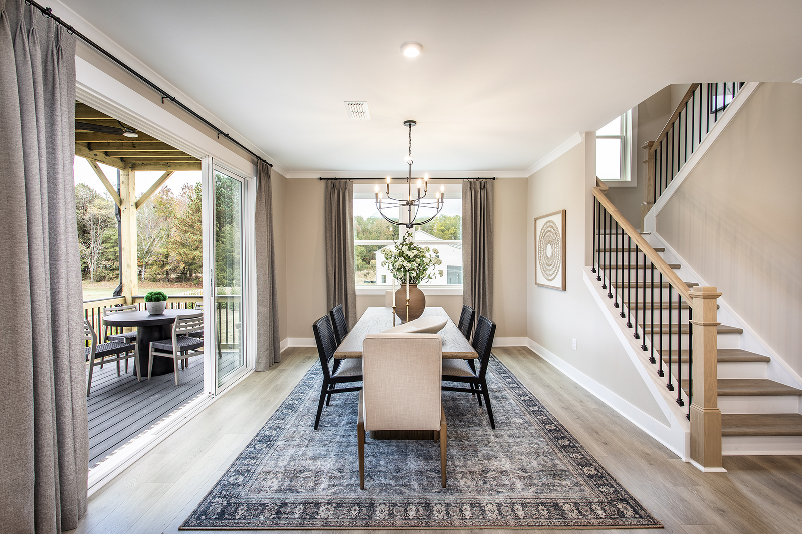 dining room open to kitchen with large table