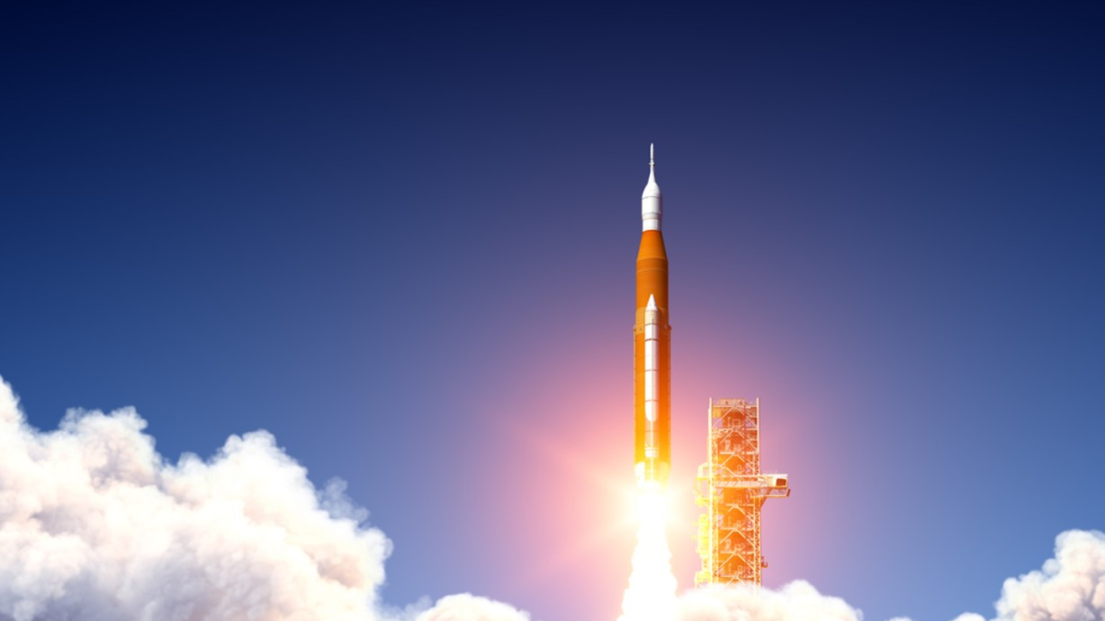 Rocket launching from pad with high-performance materials rocket nozzle