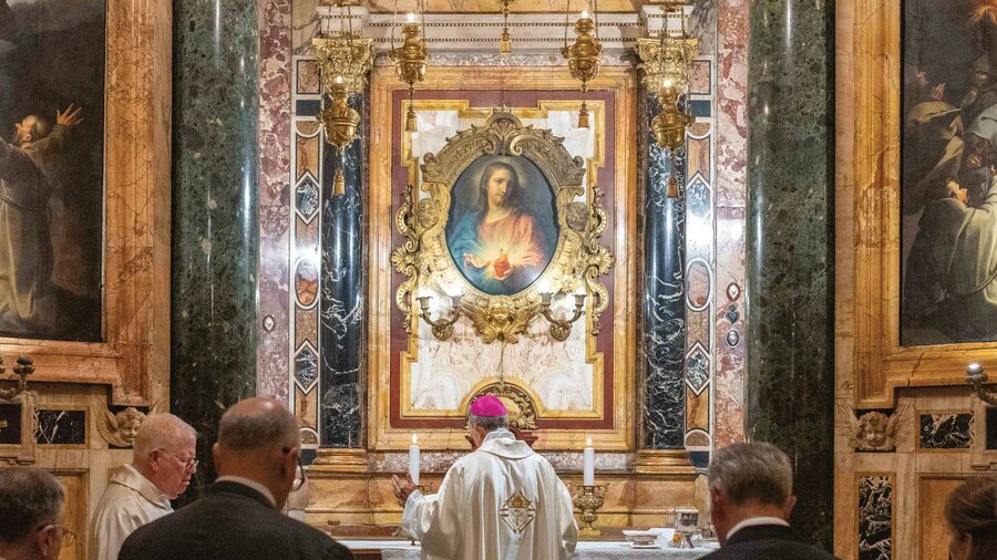 Archbishop William Lori celebrates Mass in the Church of the Gesù in Rome on Oct. 23, 2024.
