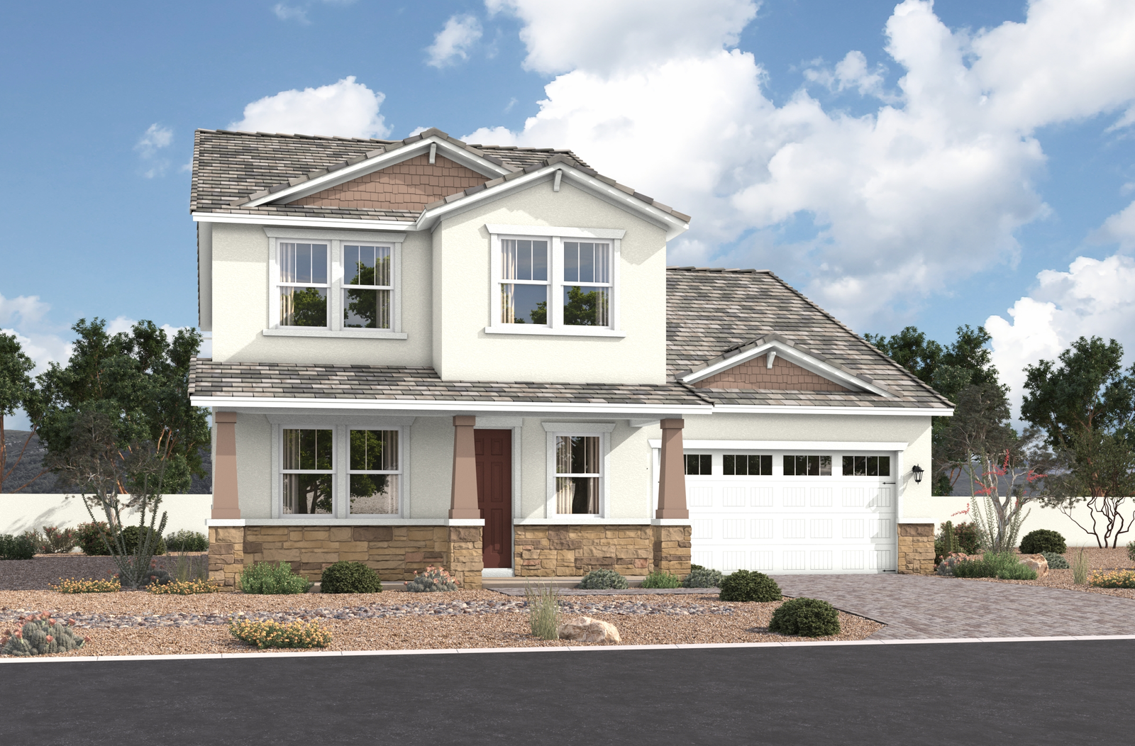 two-story home with desert landscaping