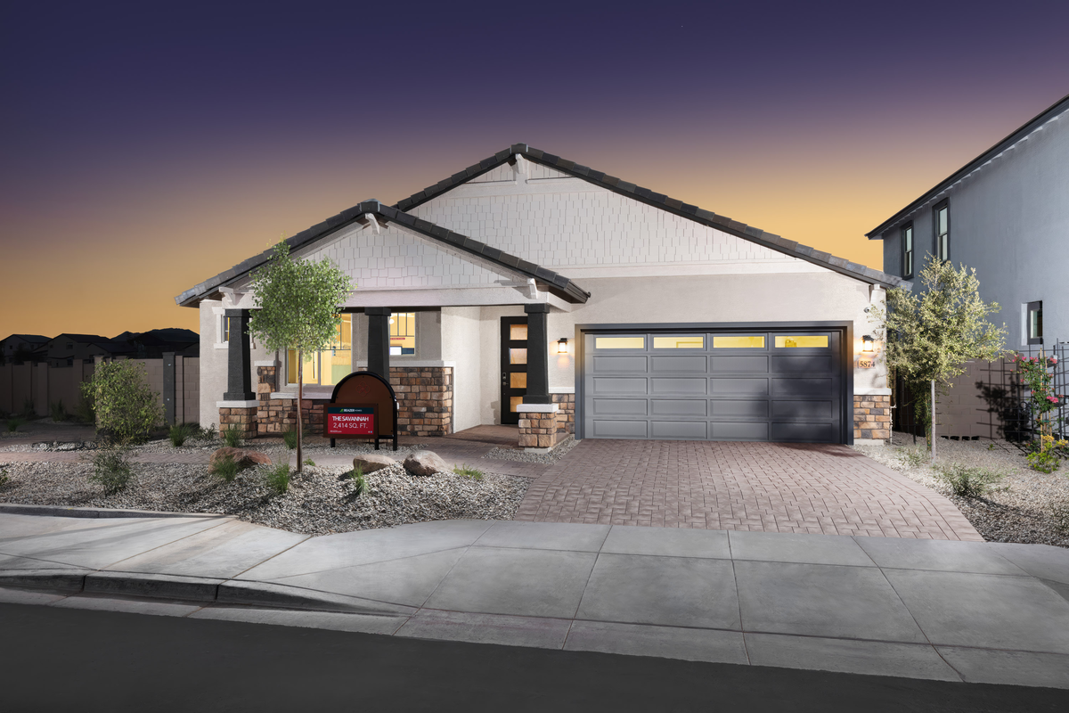 single-story home with concrete driveway
