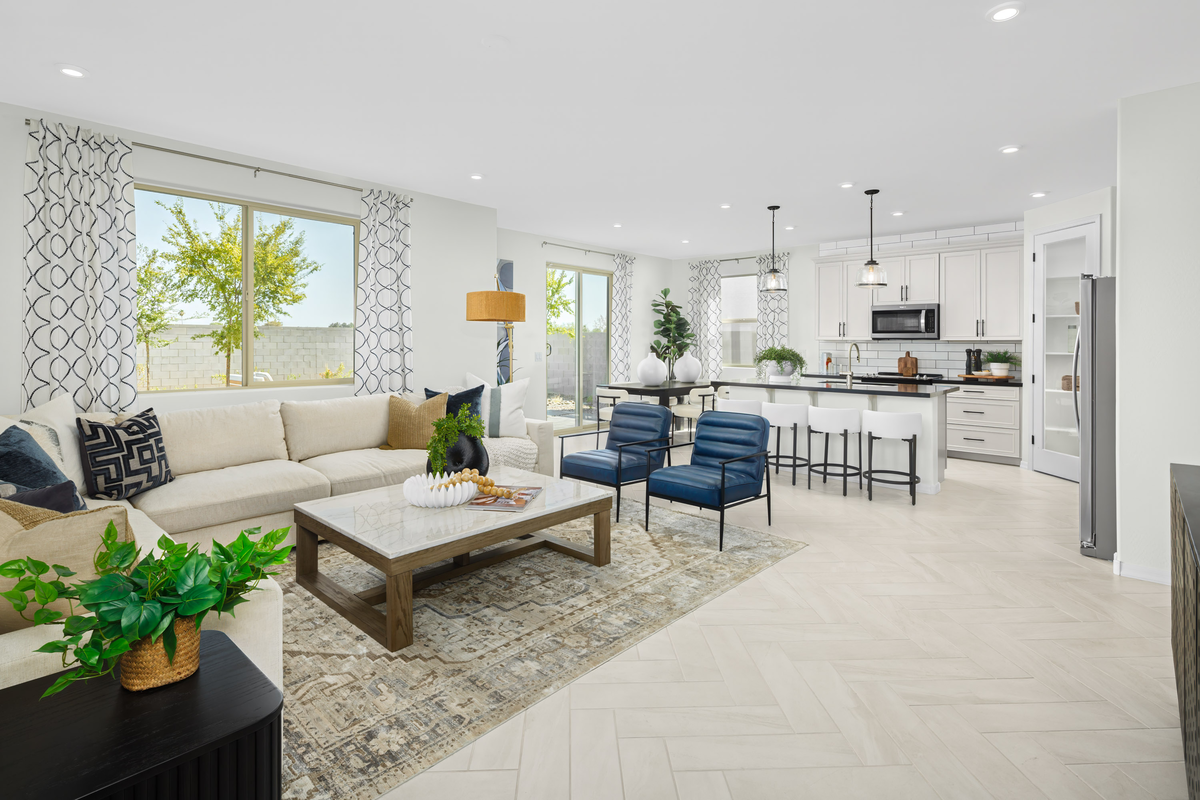 spacious great room with sofa, and chairs