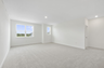 open space with access to stairs and upstairs bedrooms 