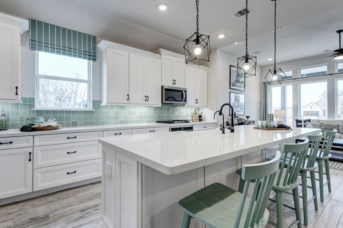 kitchen with black pendant lighting