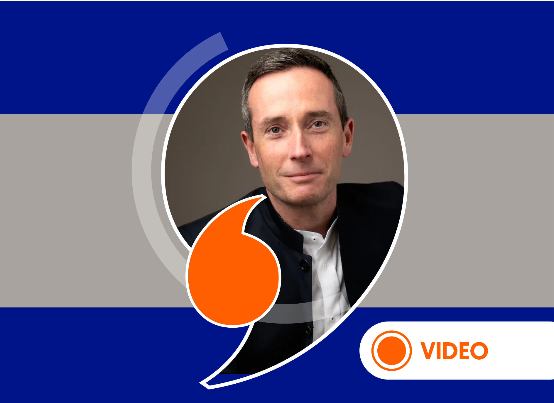 On a dark blue background, a central portrait circle shows a man with graying hair, wearing a dark jacket and white shirt. An orange speech bubble overlaps the bottom-center of the portrait circle, and a ‘VIDEO’ tag is in the bottom-right corner.