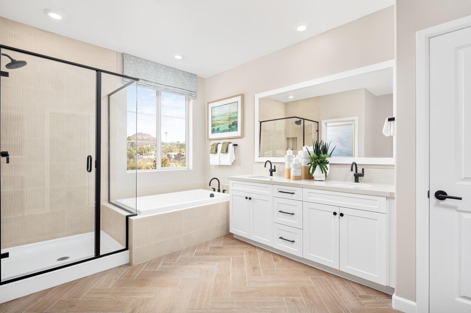 primary bathroom with separate shower and tub