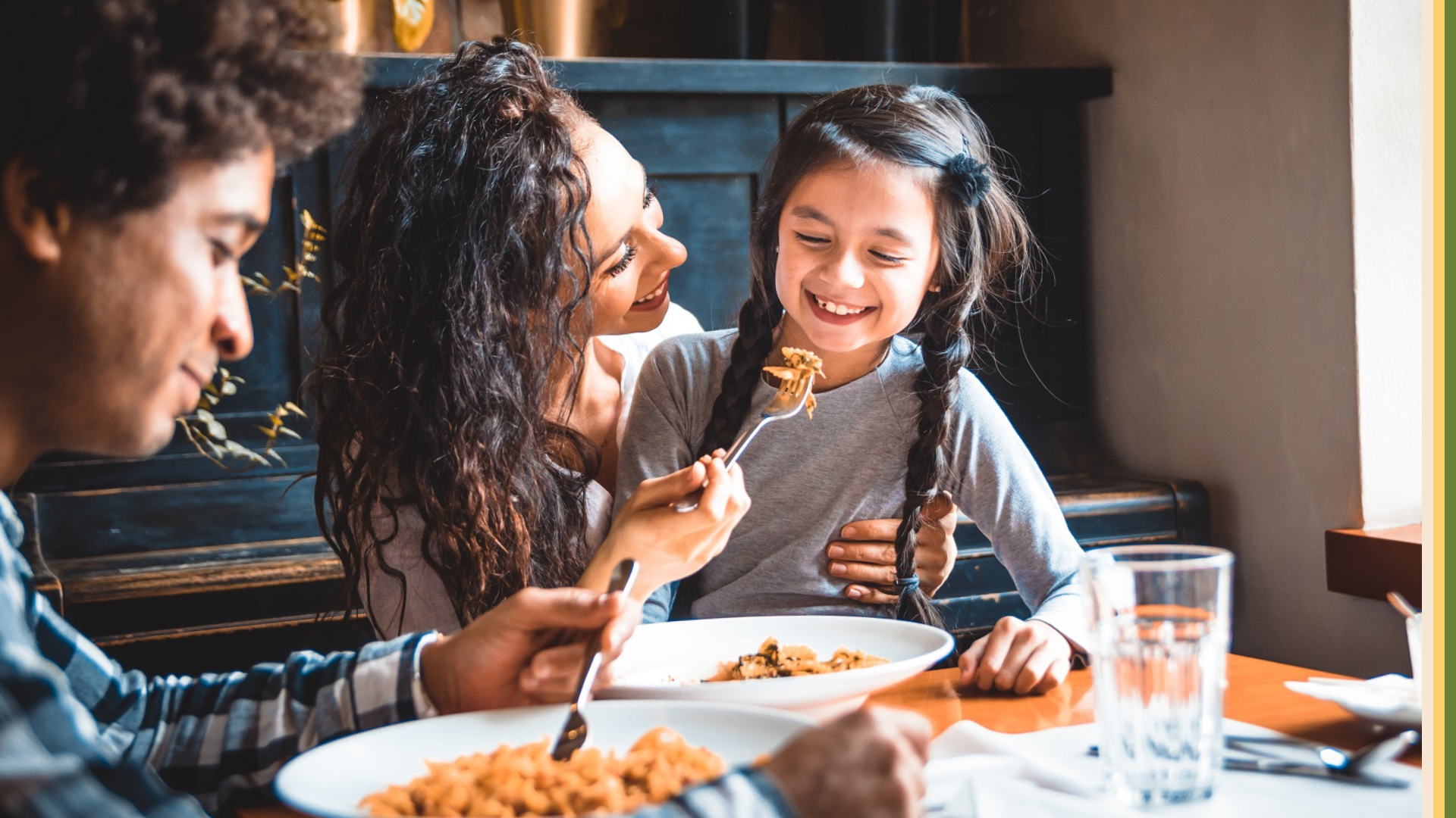 Mum and Daughter Eating at Restaurant 