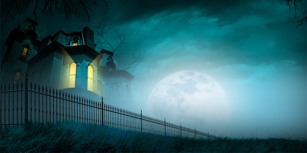 A gothic home in the moonlight