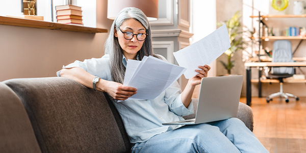 A woman reviewing paperwork
