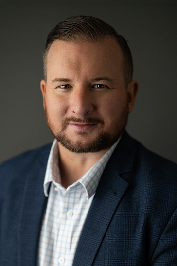 Adj Associate Professor Travis Hodgson