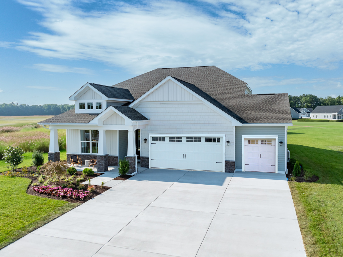 single-family home exterior with 3-car garage
