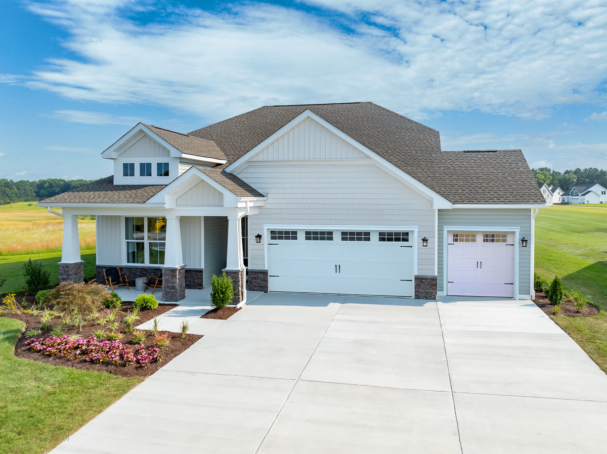 single-family home with a 3-car garage