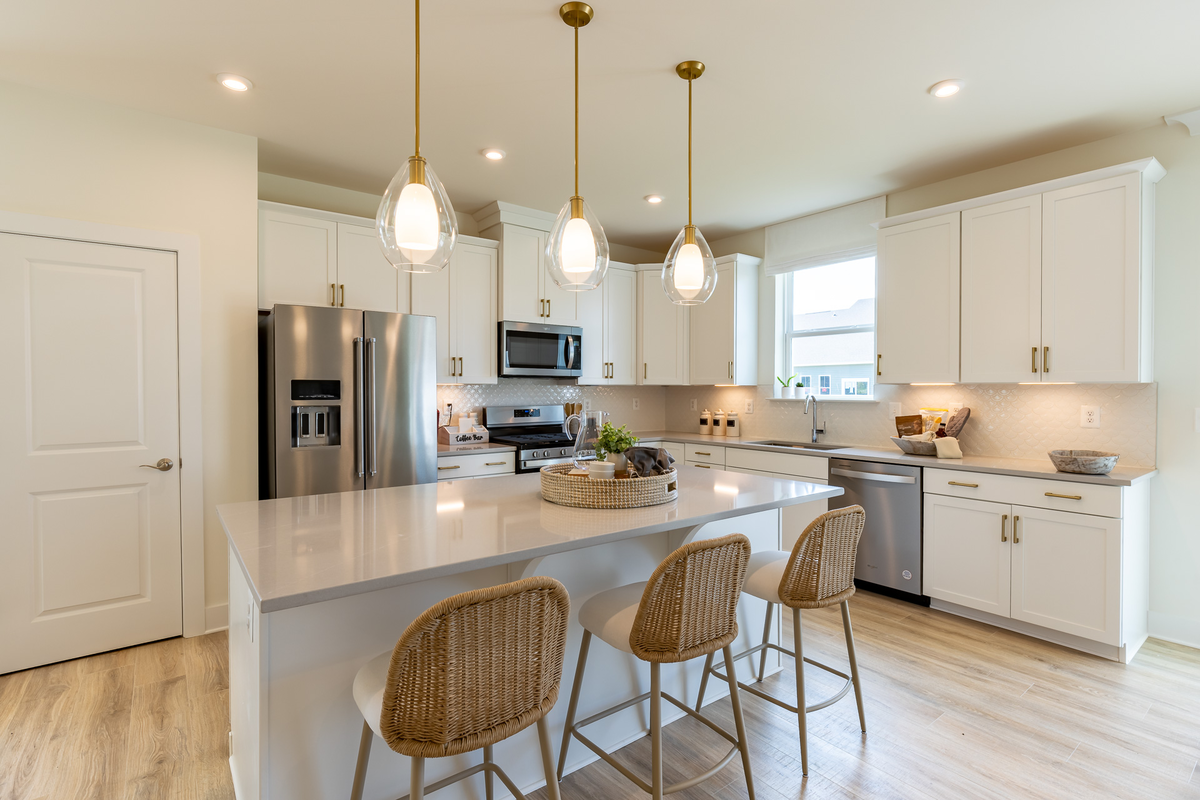 kitchen with center island and barstools