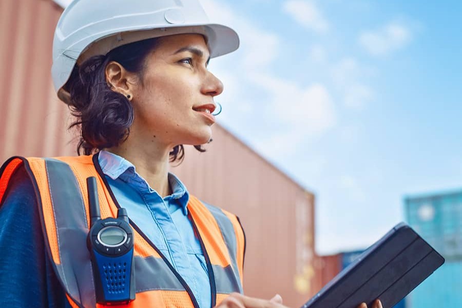 Construction female looking at ipad