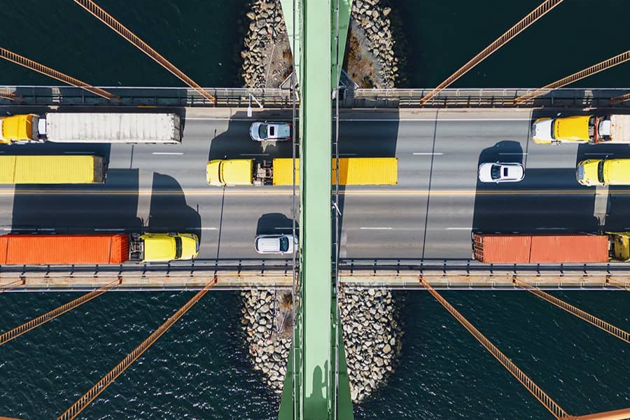 Aerial view of a bridge with vehicles on it
