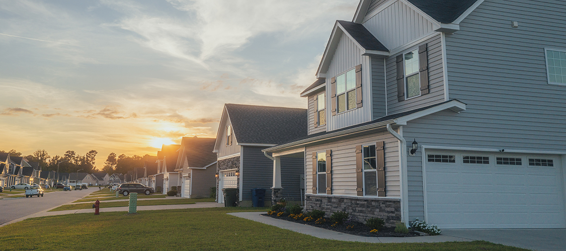 A sunrise over a nice suburban neighborhood