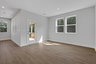 dining room with hard surface flooring and windows