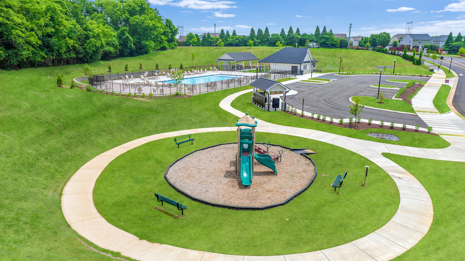 amenities with playground, pool, and clubhouse
