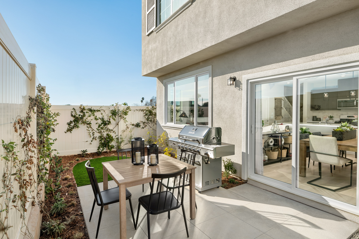 backyard with grass and sitting area