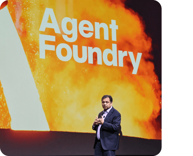 Sanjeev Siota on stage at Momentum showing Agent Foundry