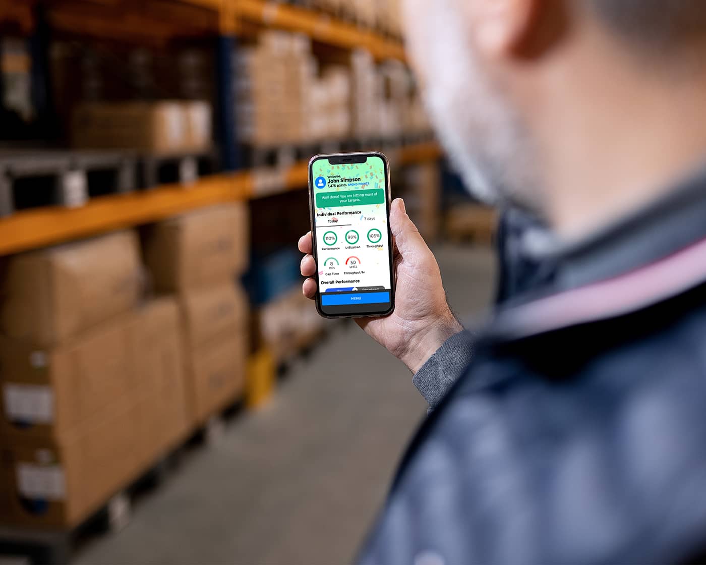 better-user-experience.jpg Warehouse operative looking for stock on a mobile device