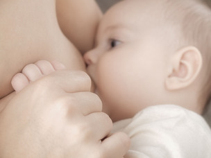 Mother breastfeeding baby