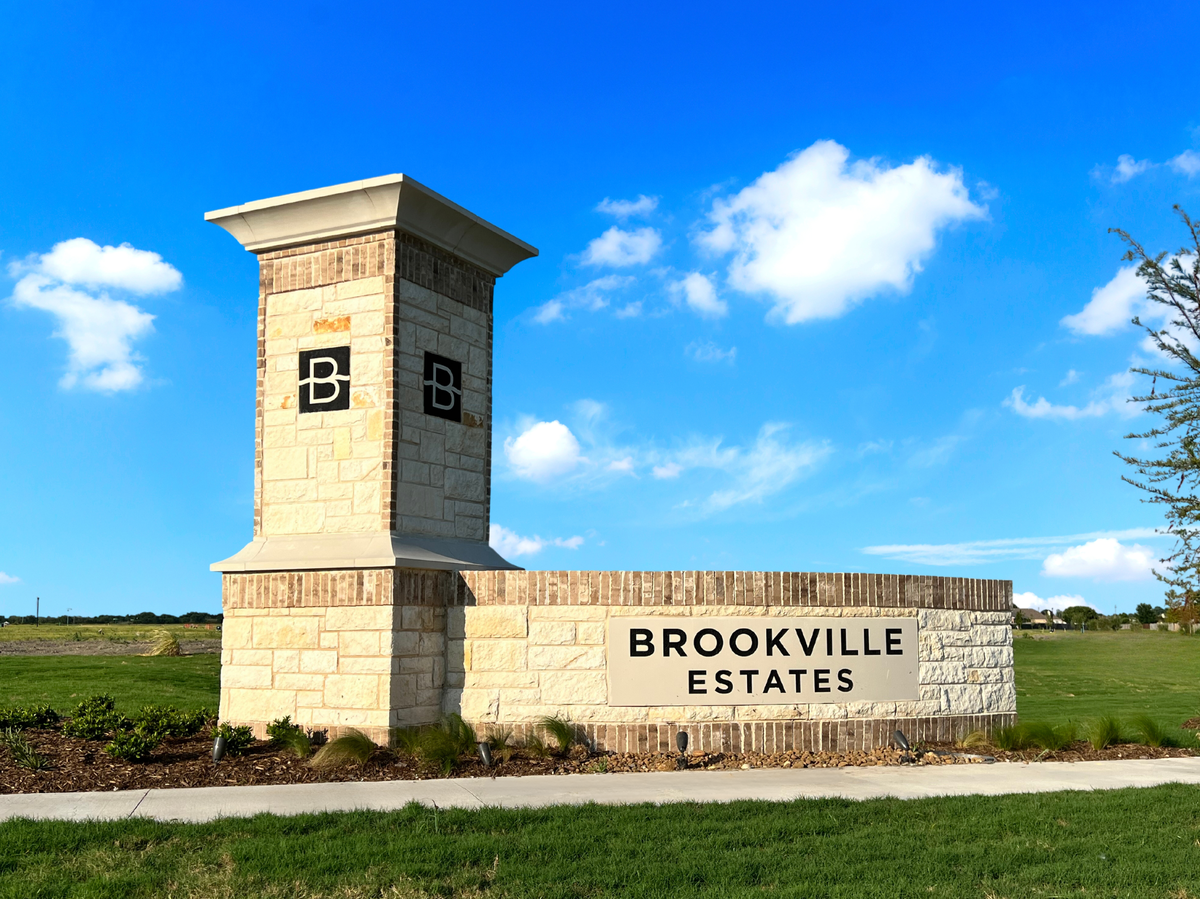 a virtual tour of a community surrounded by fields