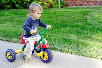 Little boy on a tricycle
