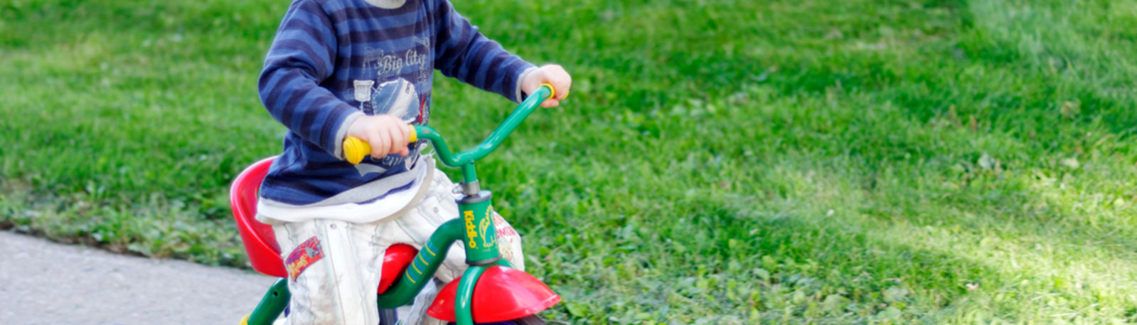 Little boy on a tricycle