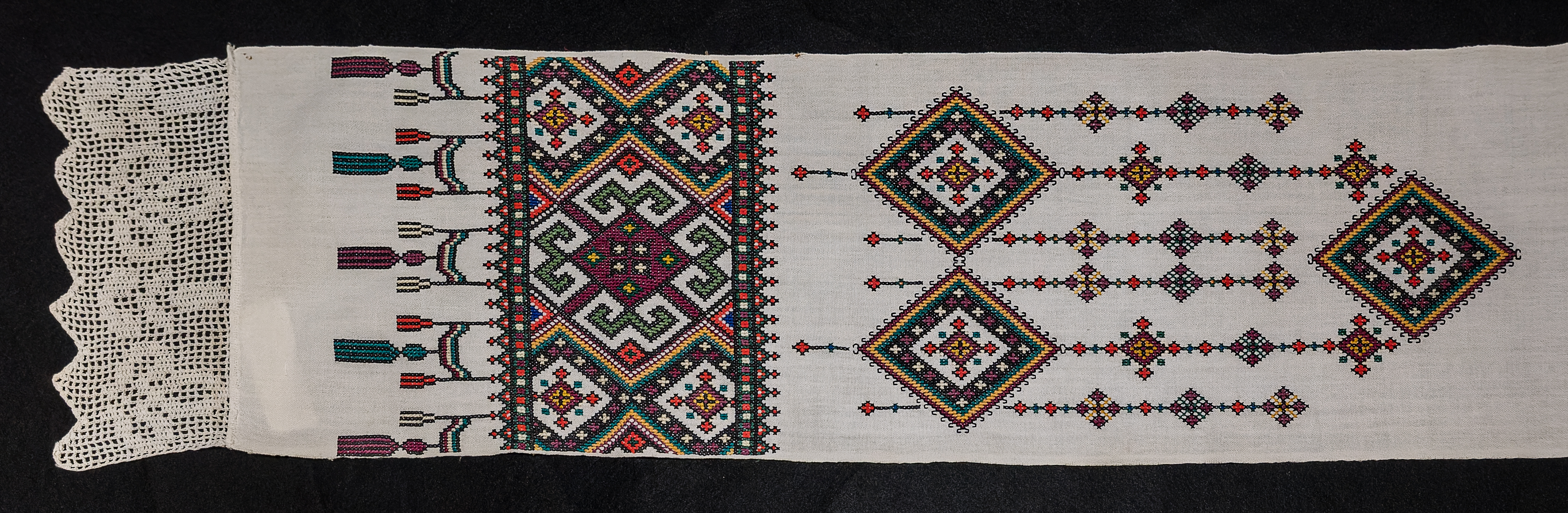 Detail image of embroidered Rushnyk from the Dolyna District, Ivano Frankivsk Region, Ukraine, made in the mid-20th century. 