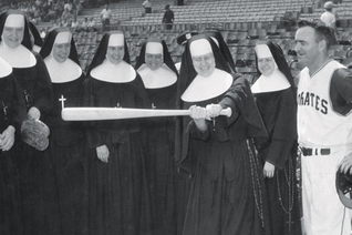 Pittsburgh Pirates manager Danny Murtaugh visits with religious sisters on Nuns’ Day at Forbes Field in Pittsburgh in the early 1960s.